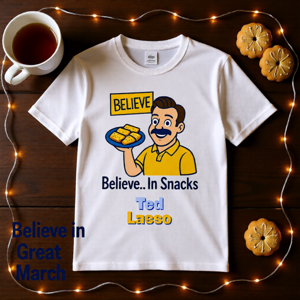20251215103932-1f0d9a25-7505-6436-a436-4a0b90d79124-1.png Ted Lasso Inspired “Believe… In Snacks” T-Shirt, Funny TV Show Quote Tee, Positive Vibes Shirt, Gift for Fans