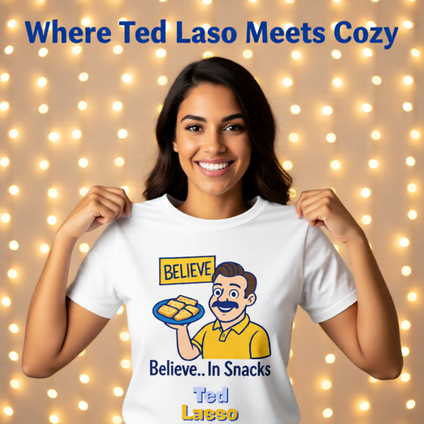 20251215103932-1f0d9a25-764b-6e12-834d-62fa27fc9c39-1.png Ted Lasso Inspired “Believe… In Snacks” T-Shirt, Funny TV Show Quote Tee, Positive Vibes Shirt, Gift for Fans