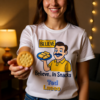 20251215103932-1f0d9a25-76d8-638a-ab6d-4a0b90d79124-1.png Ted Lasso Inspired “Believe… In Snacks” T-Shirt, Funny TV Show Quote Tee, Positive Vibes Shirt, Gift for Fans