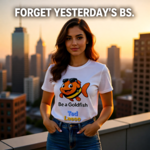20251215112954-1f0d9a96-0b13-6dfe-b886-0acdefa527fd-1.png Ted Lasso Inspired “Be a Goldfish” T-Shirt, Motivational TV Show Quote Tee, Positive Mindset Shirt, Gift for Fans
